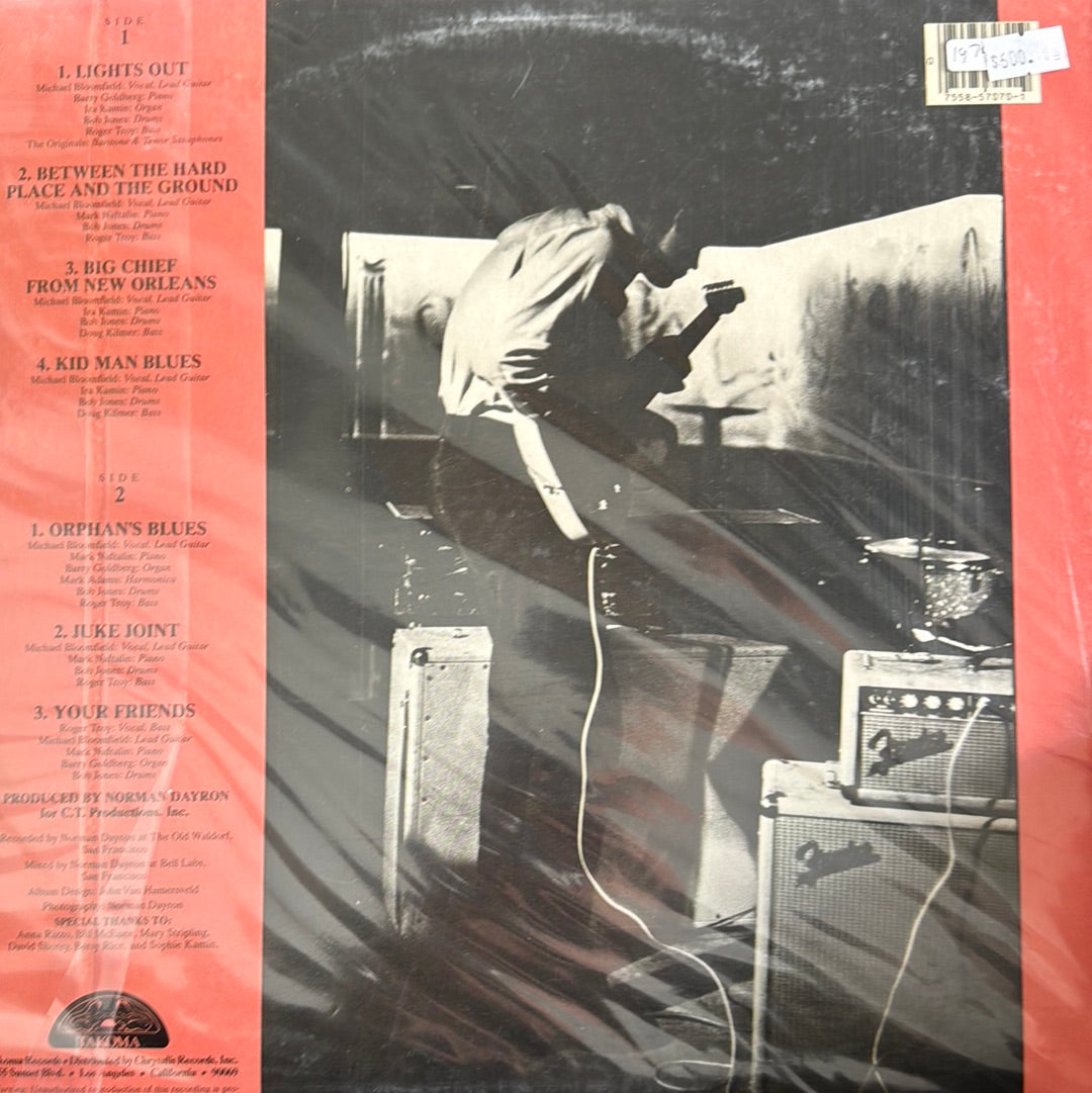 BETWEEN THE HARD PLACE & THE GROUND Michael Bloomfield