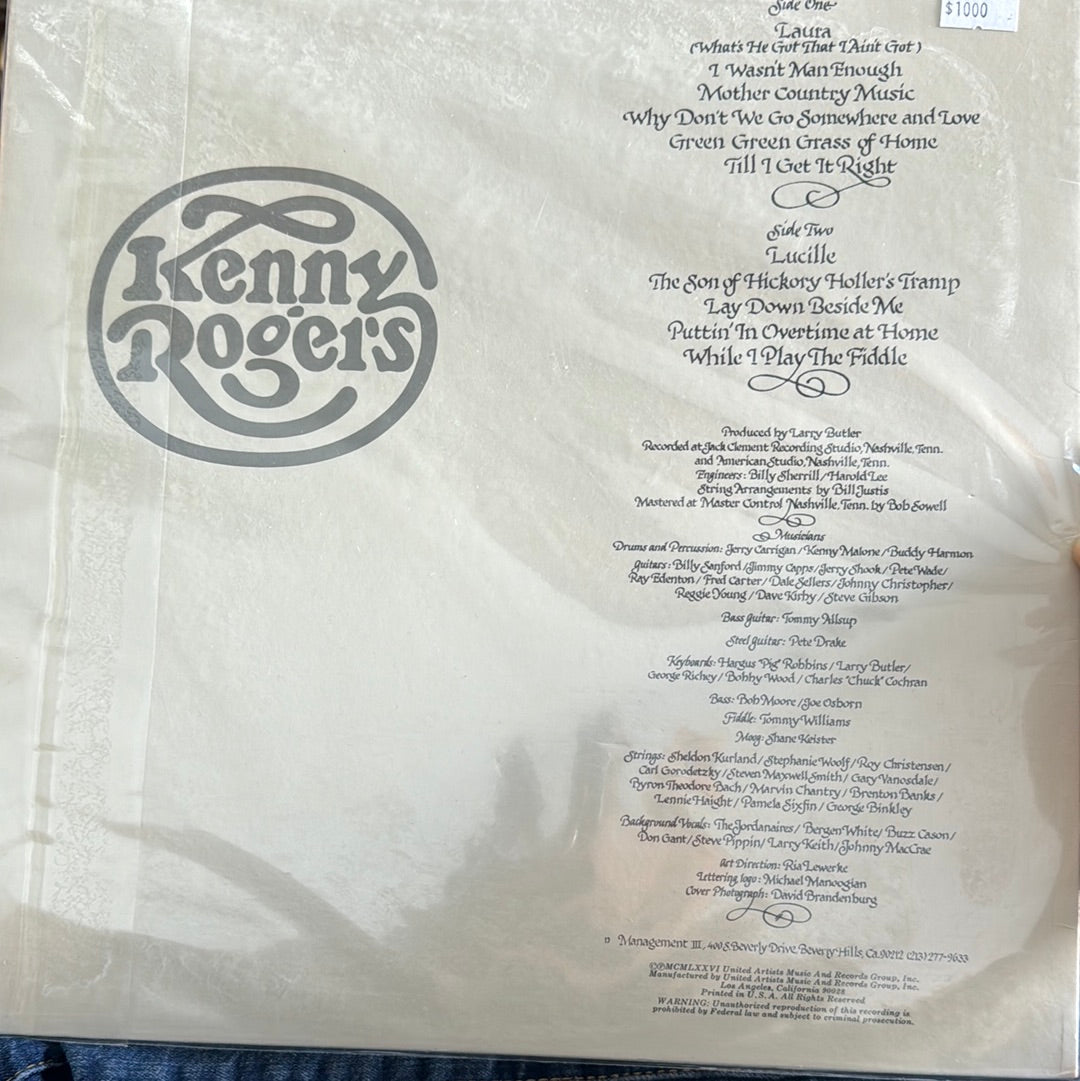 KENNY ROGER Vs